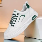 თეთრი სპორტული ბოტასები მწვანე დეტალებით - Image 3